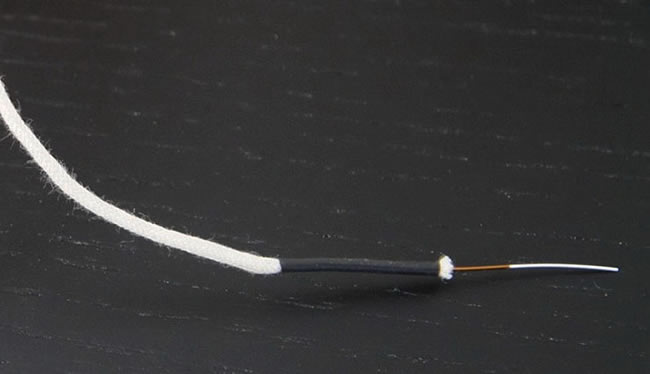 Audio Consulting 0.5mm Silver Cryogenic Wire with Cotton Sleeving example, heat-shrink not included.